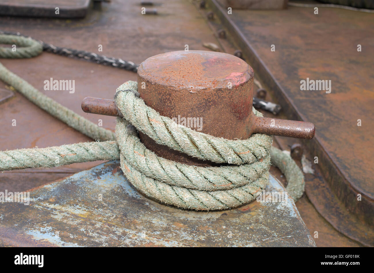 Old wrapped around bollard deck fitting Stock Photo