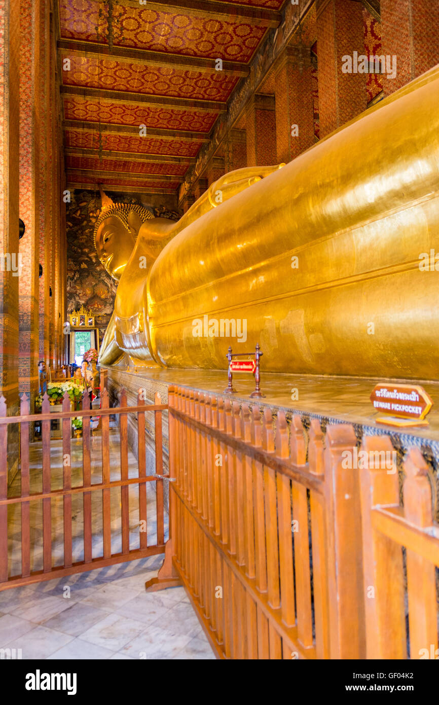Reclining big Buddha gold statue in Wat Pho, Bangkok, Thailand Stock ...