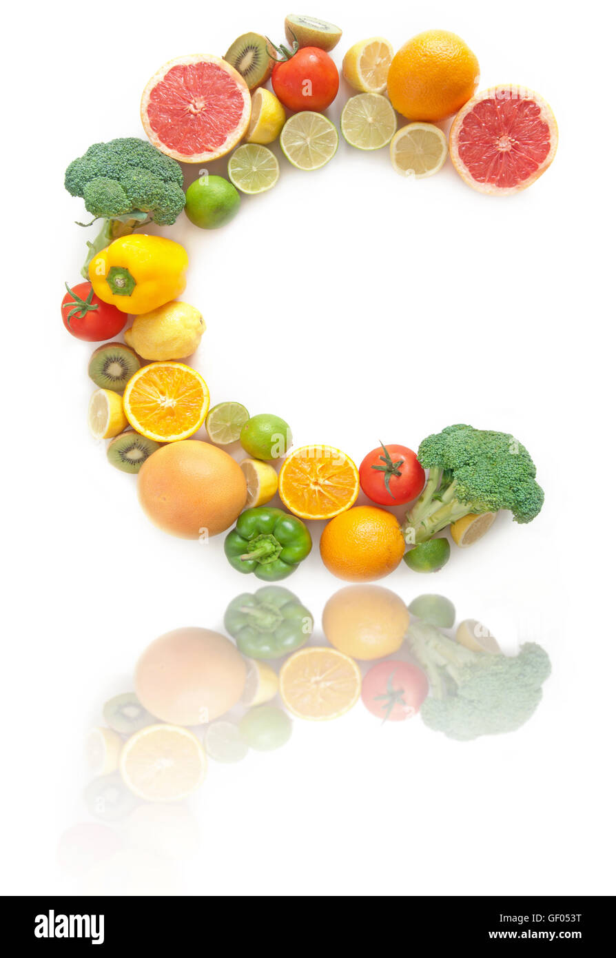 C shape letter made from fruits and vegetables high in vitamin C Stock Photo