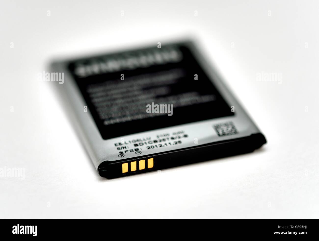 A detailed close up view of a Samsung smart phone Li-Ion battery Stock Photo