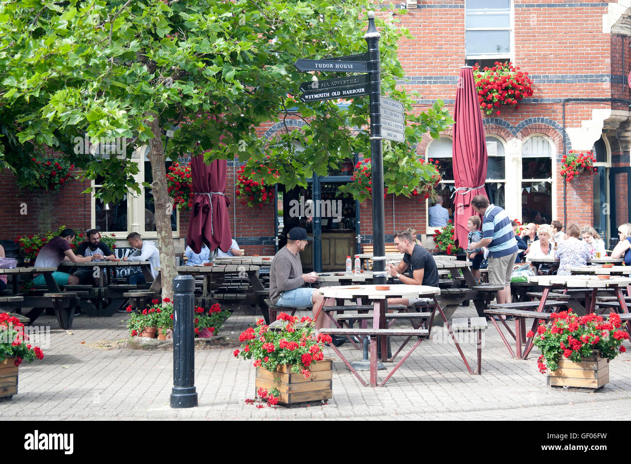 Drinkers and diners in Hope Square, Weymouth, Dorset UK Stock Photo - Alamy