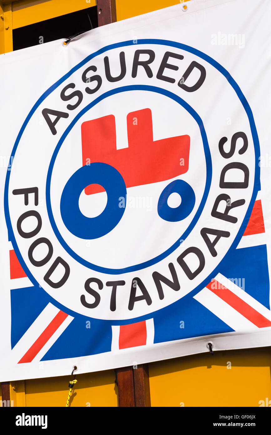 Assured Food Standards logo with little red tractor on food stall selling meat at New Forest & Hampshire County Show, Brockenhurst in July Stock Photo