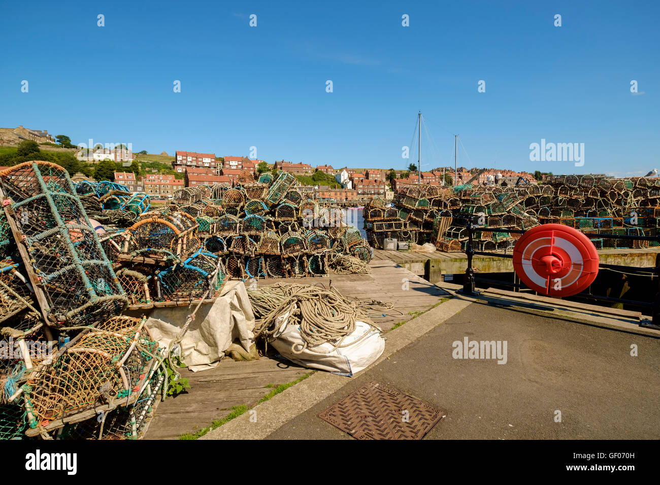 Lobster pots on the quay side, Whitby, North Yorkshire, UK Stock Photo