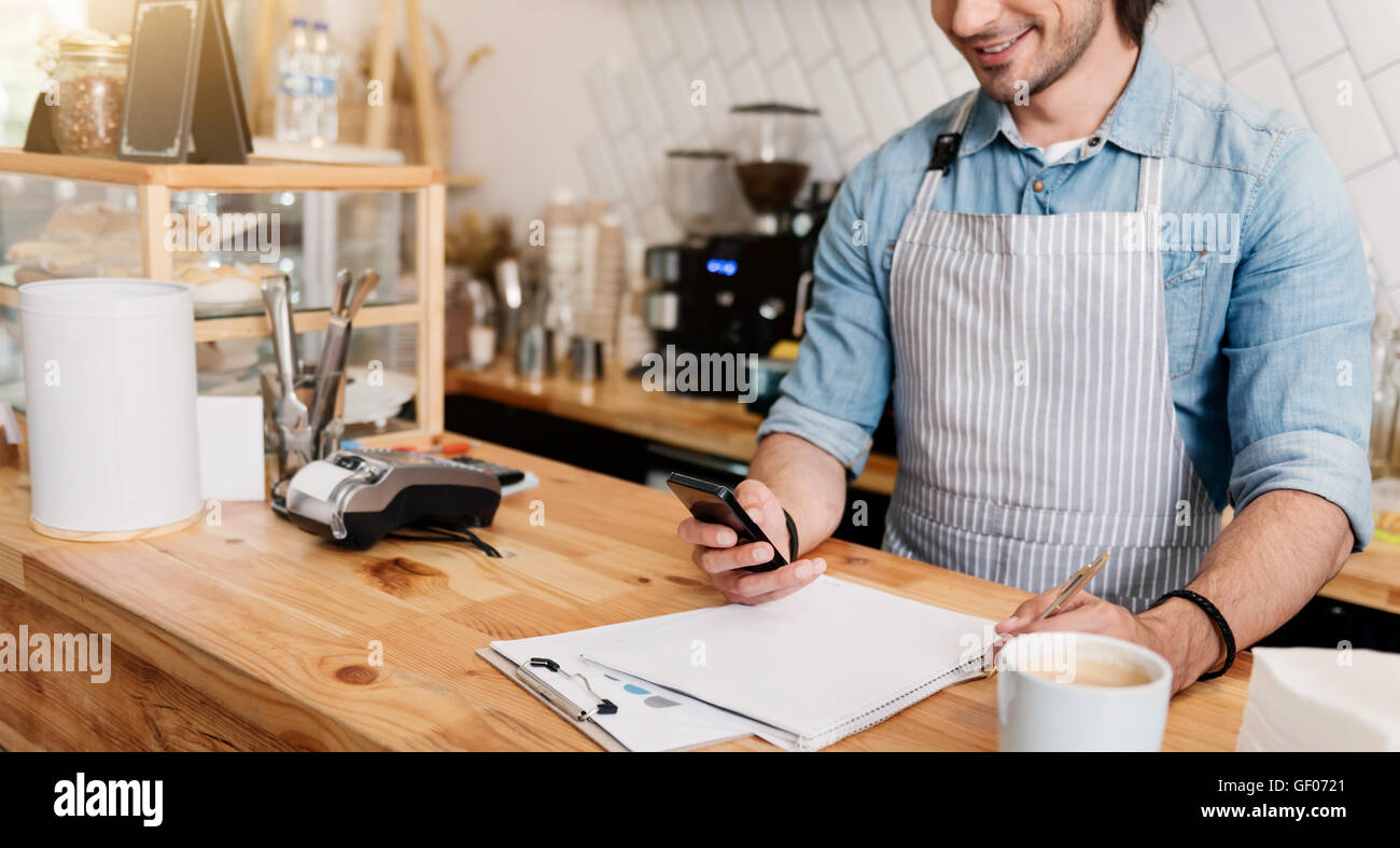 Cropped coffee shop manager mobile hi-res stock photography and images ...