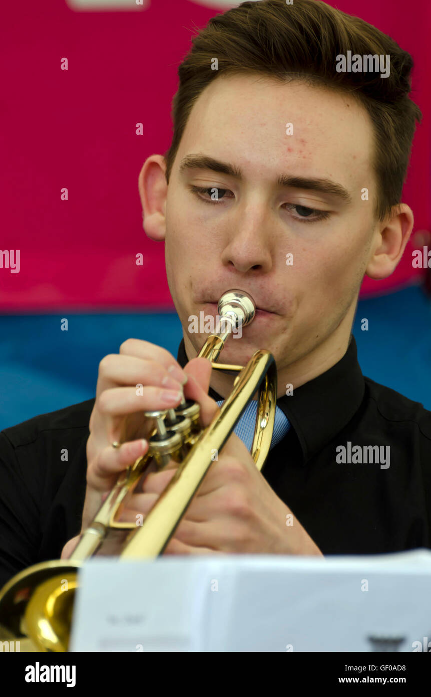 Trumpet player with the St. Aiden's Swing Band (school band) playing at the Mardi Gras, part of