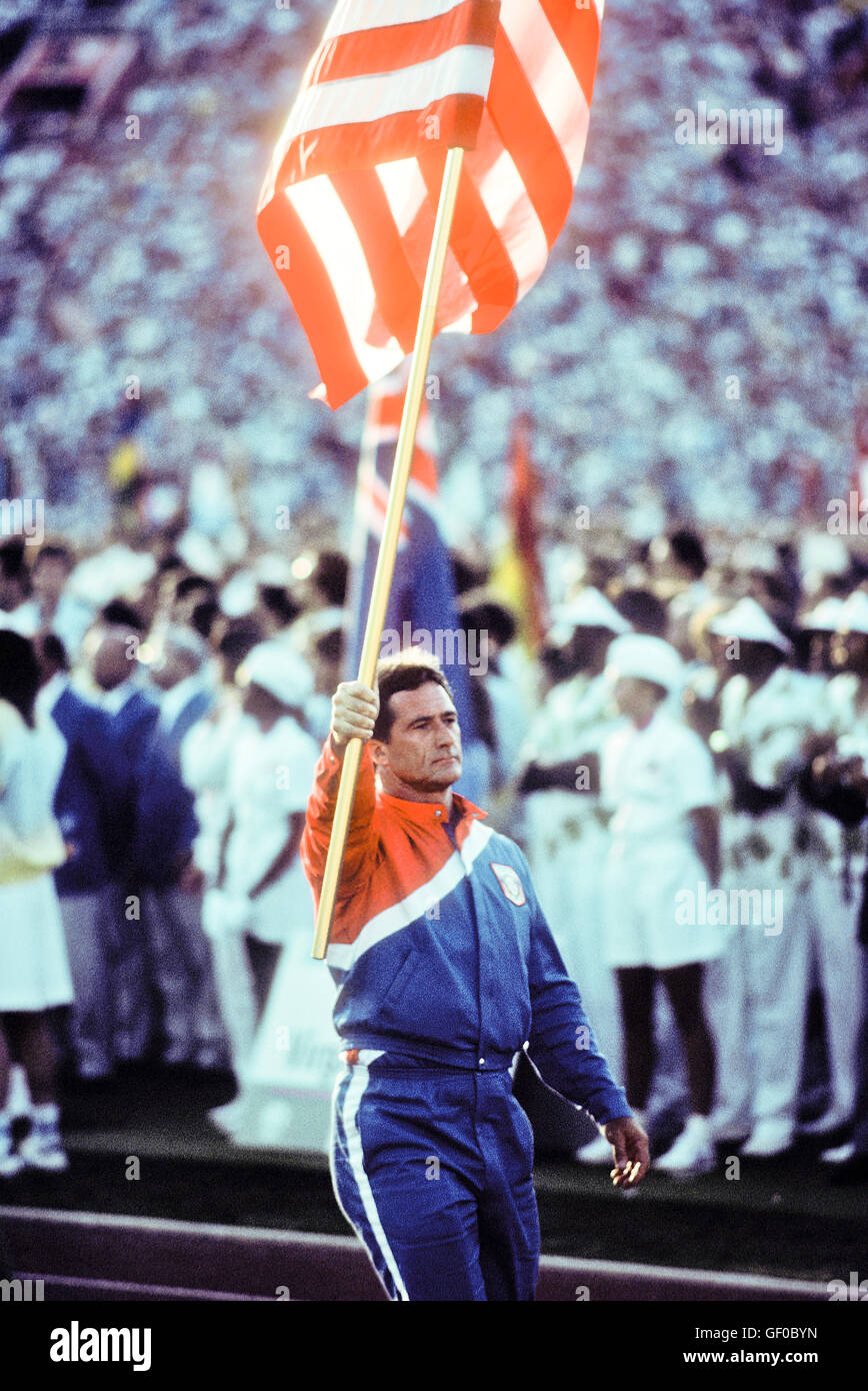 Ed Burke is flagbearer for US team during opening ceremonies at 1984