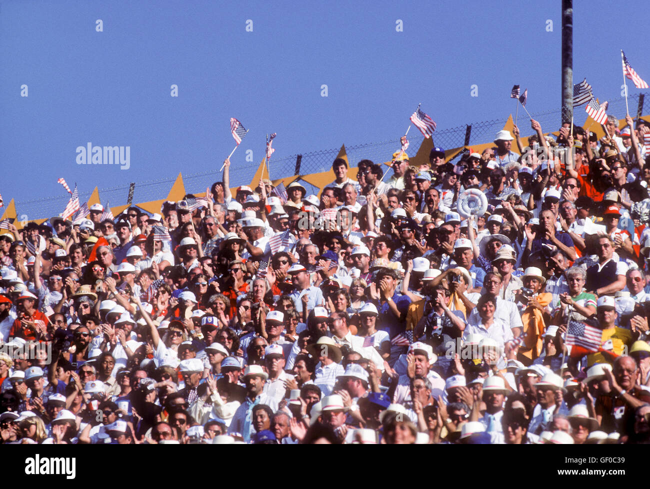 Crowd cheering in stadium at 1984 Olympic Games in Los Angeles. Stock Photo