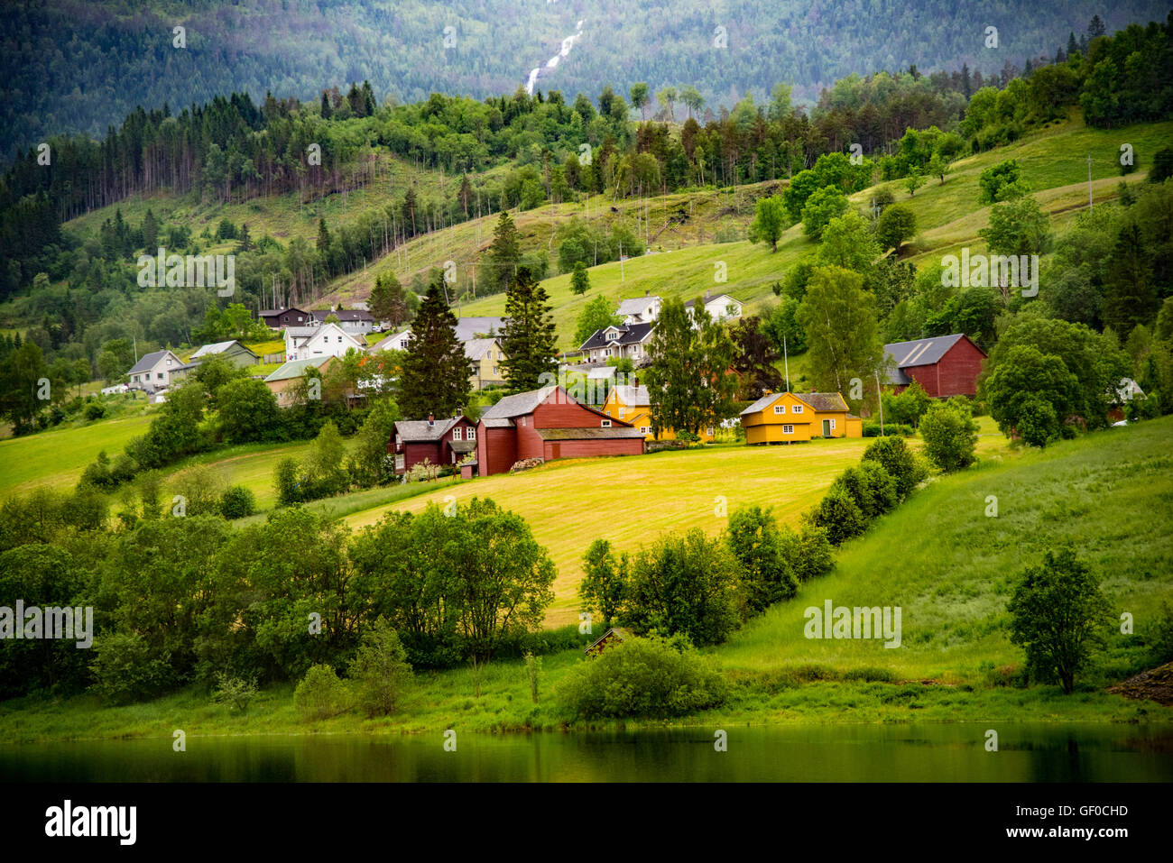 Colorful farm from Flam Train in Springtime. Flam, Norway, Scandinavia, European Stock Photo