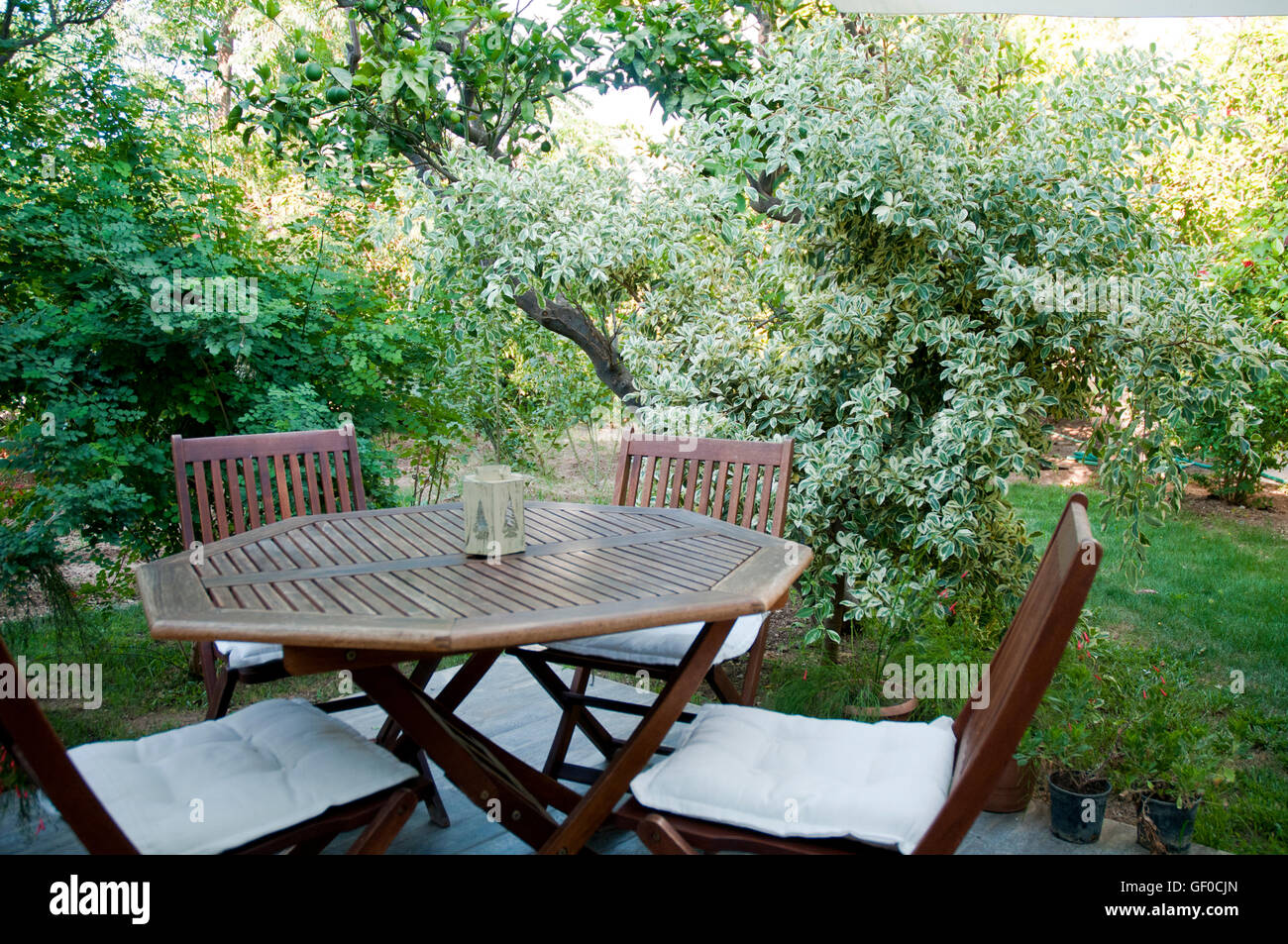 Outdoor Seating Area in Green Garden – Relaxing Hotel Patio in Bodrum Stock Photo