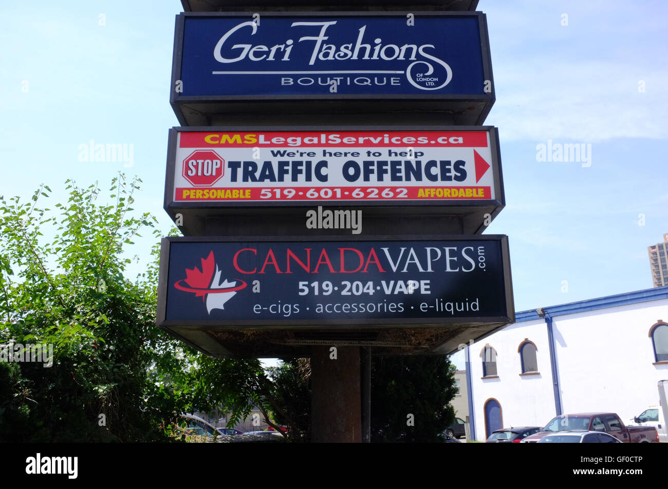 Roadside shops signs on the side of the road in the Canadian city of