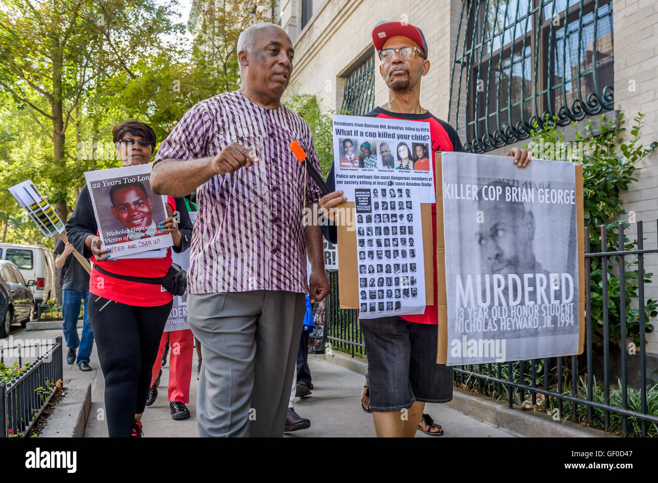 Brooklyn, New York, USA. 27th July, 2016. The parents of Nicholas Heyward Jr., along with NYC Assemblyman Charles Barron, relatives of victims of police brutality, neighbors and advocacy groups marched to the Brooklyn DA's office to deliver a letter of support signed by over 50 organizations and public figures who stand in solidarity with #JusticeForNicholasHeywardJr and tell DA Ken Thompson that he must fulfill his campaign promise and fully investigate the 1994 murder of little Nicholas. Credit:  PACIFIC PRESS/Alamy Live News Stock Photo