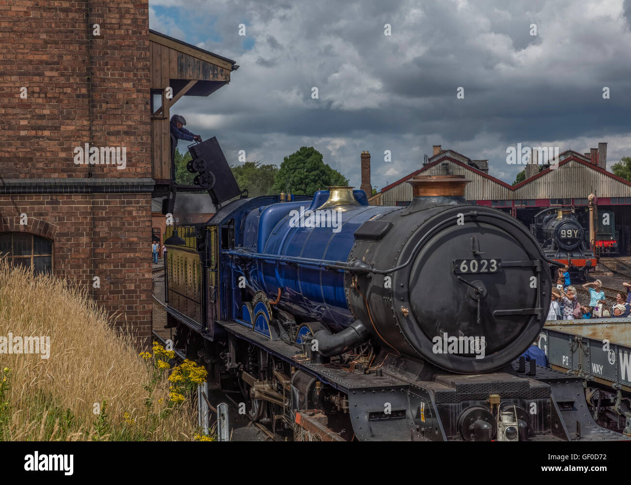 Restored steam locomotive at the Didcot Railway Centre being filled with coal Stock Photo