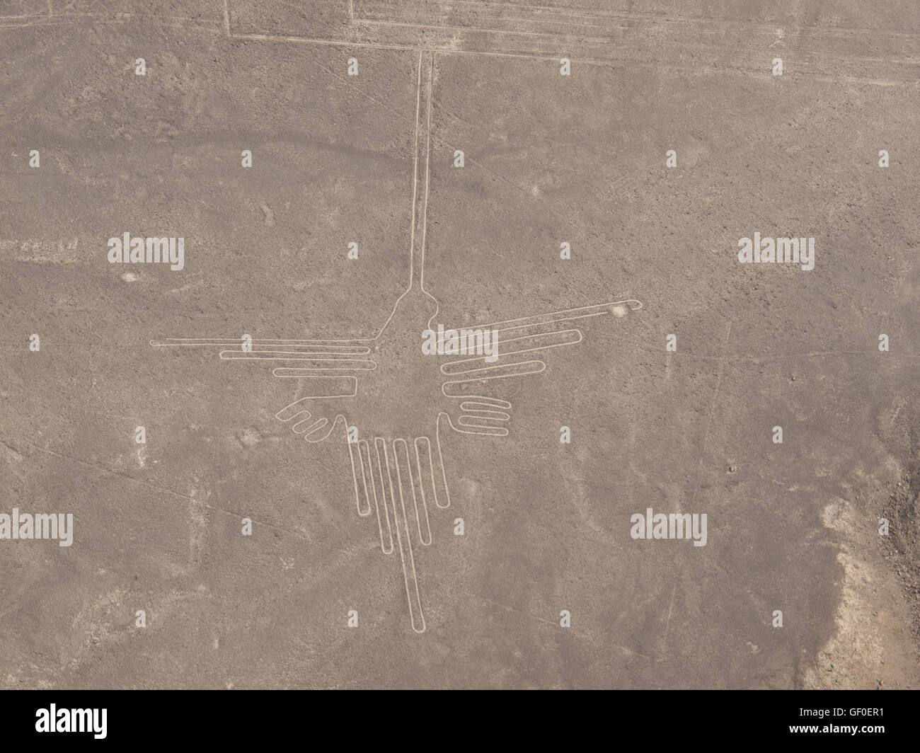 The hummingbird, one of the Nazca lines seen from the plane. Stock Photo