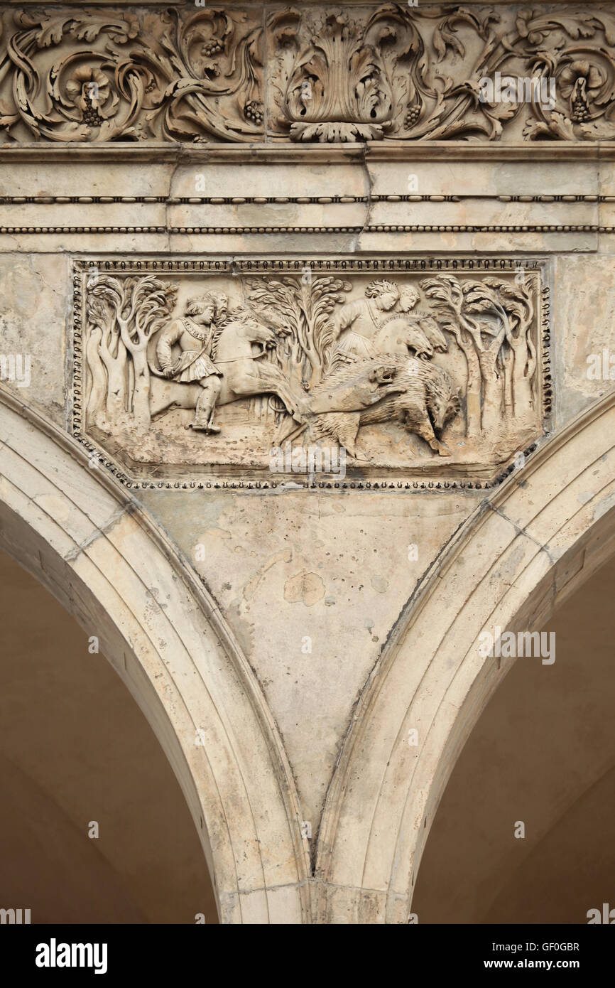 Royal wild board hunting. Renaissance relief on the Summer Palace of Queen Anna in the Royal Garden of Prague Castle in Prague, Czech Republic. Stock Photo