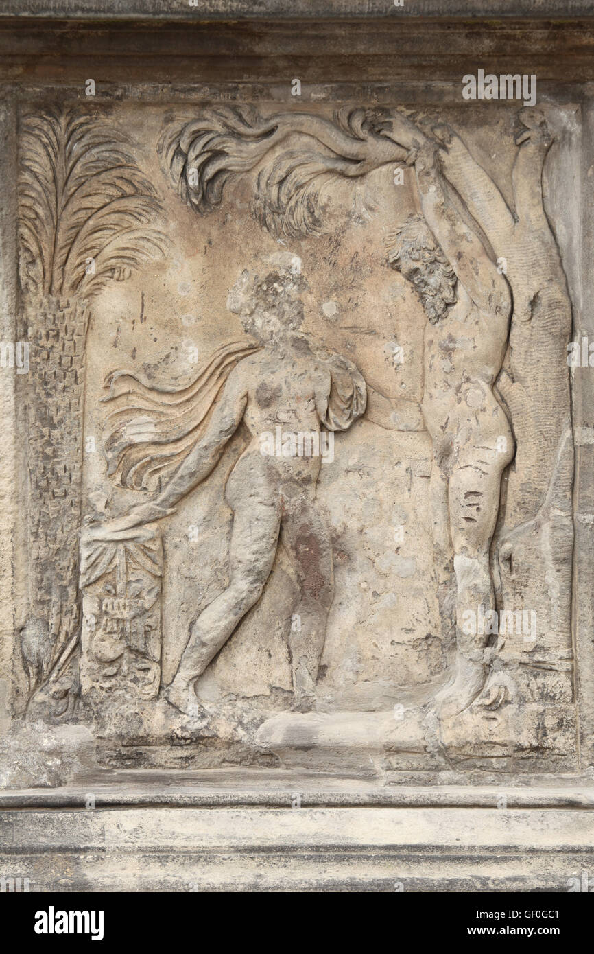 Apollo flaying Marsyas. Renaissance relief on the Summer Palace of Queen Anna in the Royal Garden of Prague Castle in Prague, Czech Republic. Stock Photo