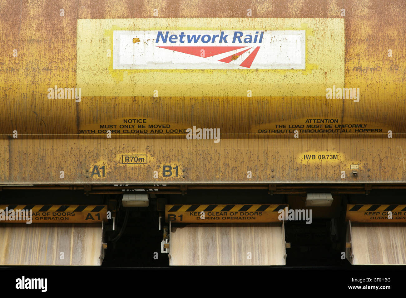 Network Rail logo on side of ballasting wagon used in railway