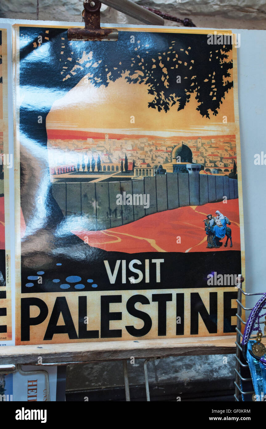 Israel, Jerusalem, Old City: a poster inviting to visit Palestine hanging in a gift shop in the Muslim Quarter Stock Photo