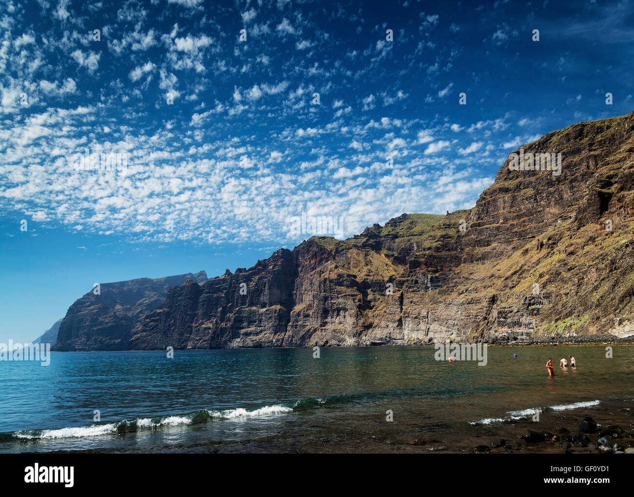 los gigantes cliffs nature landmark and volcanic black sand beach in south tenerife island spain Stock Photo