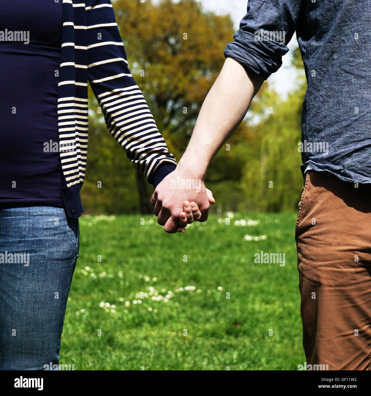 couple holding hands Stock Photo