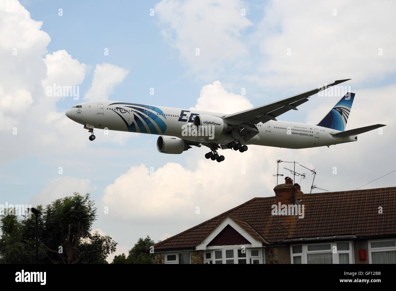 Egyptair Boeing 777-300ER SU-GDP landing at London Heathrow Airport, UK Stock Photo