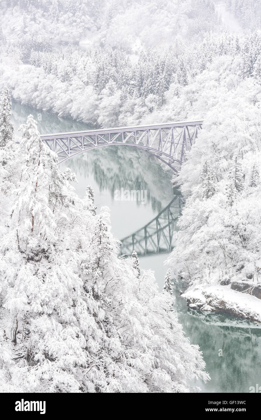 Winter landscape snow covered trees with River and Bridge Stock Photo ...