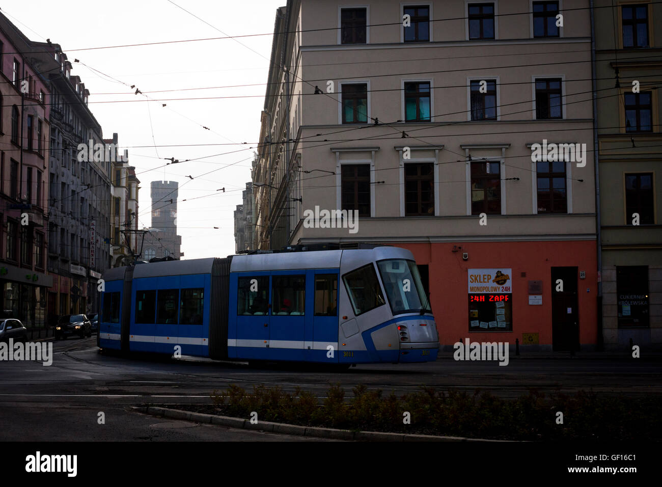 A tram turning at an intersection in Wroclaw, Poland. Stock Photo