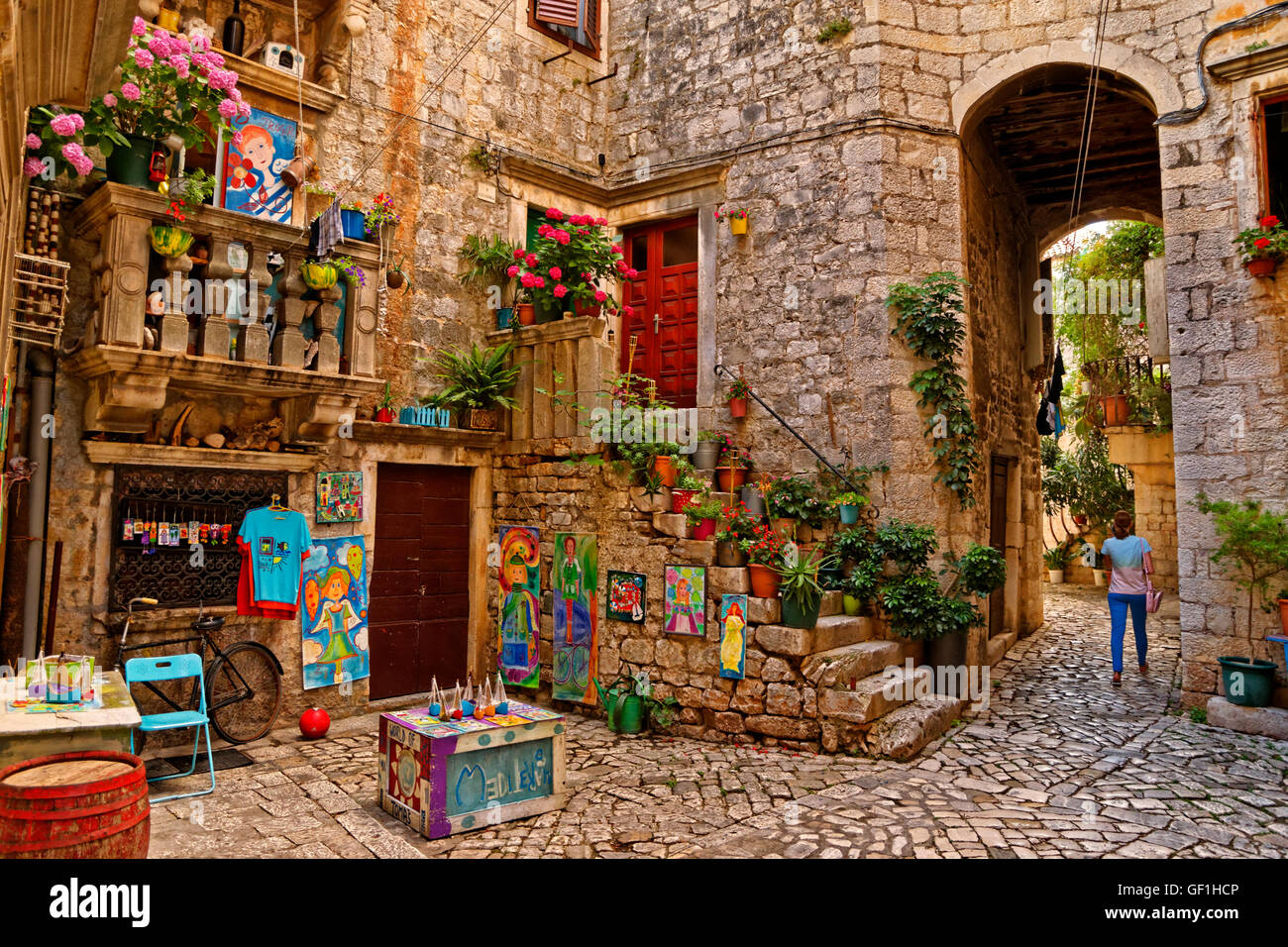 Decorative old town alleyway & homes behind the waterfront of Trogir, Croatia Stock Photo