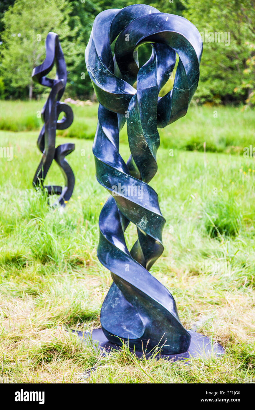 Sculpture at Kingham Lodge during Oxfordshire Artweeks 2016 by Victor Matafi and Liberty Chuma. Stock Photo