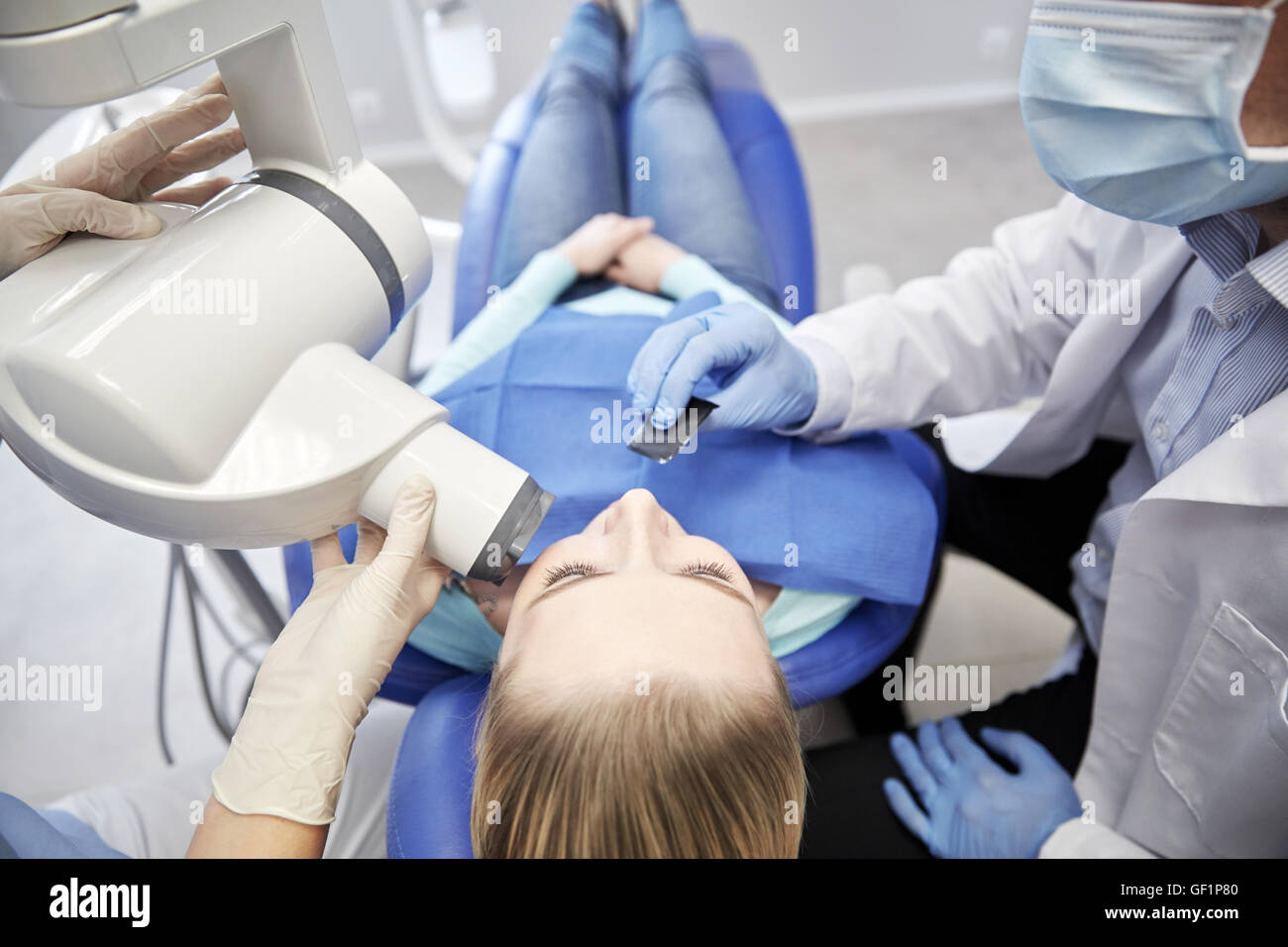 dentist and patient with dental xray machine Stock Photo Alamy