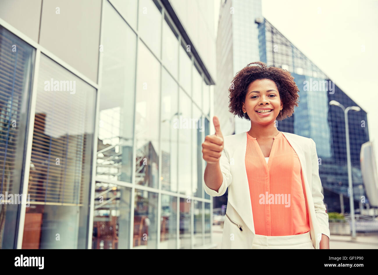Thumbs up young african businesswoman hi-res stock photography and ...
