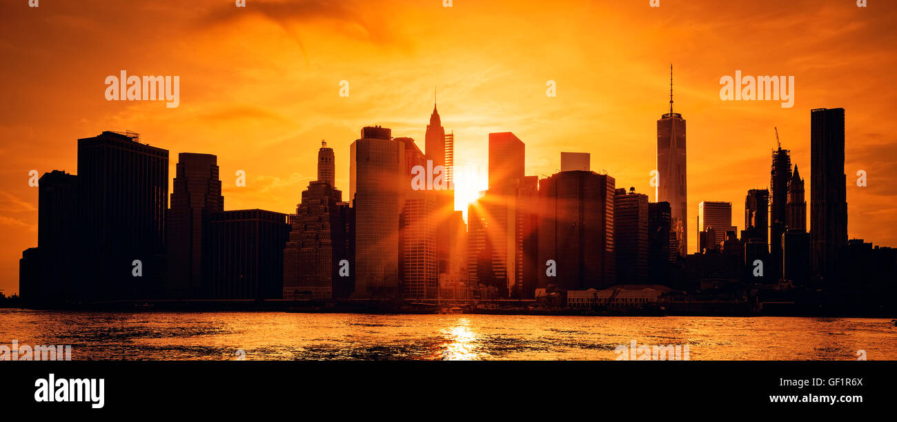 Panoramic view of New York City Manhattan midtown at sunset Stock Photo ...