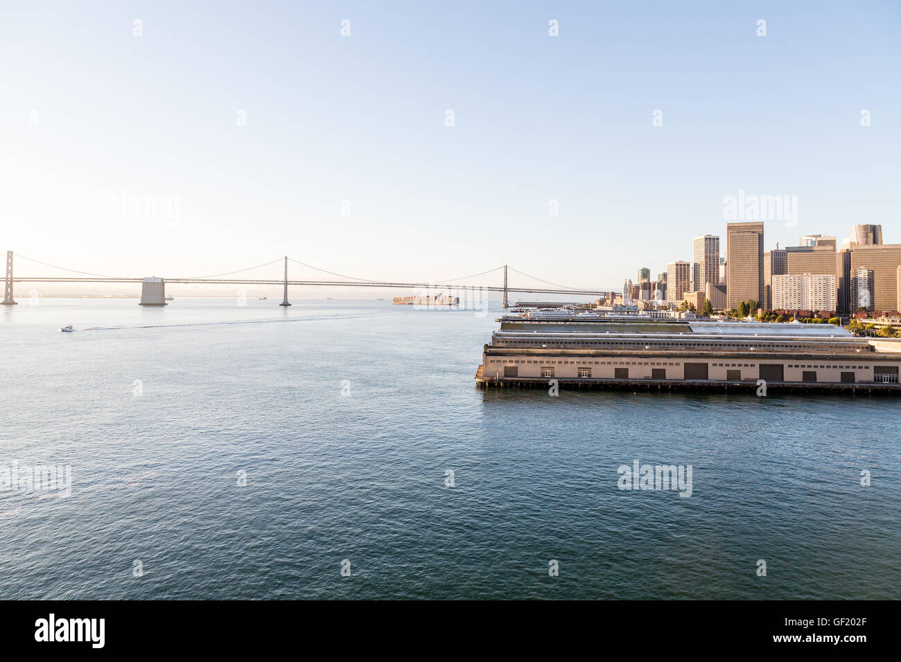 Bay Bridge and Embarcadero at Dawn in San Francisco Stock Photo