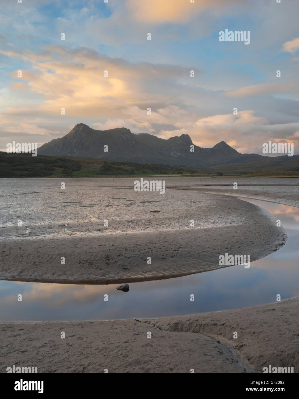 Dramatic morning cloud over the mountain Ben Loyal in Sutherland just before  sunrise, Scotland, Scottish Highlands, UK Stock Photo