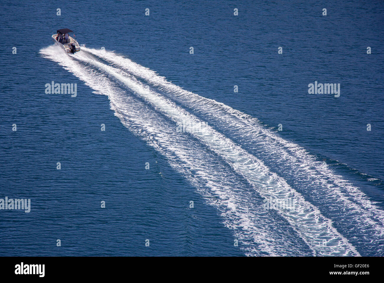Trail on sea surface behind of speed boats Stock Photo