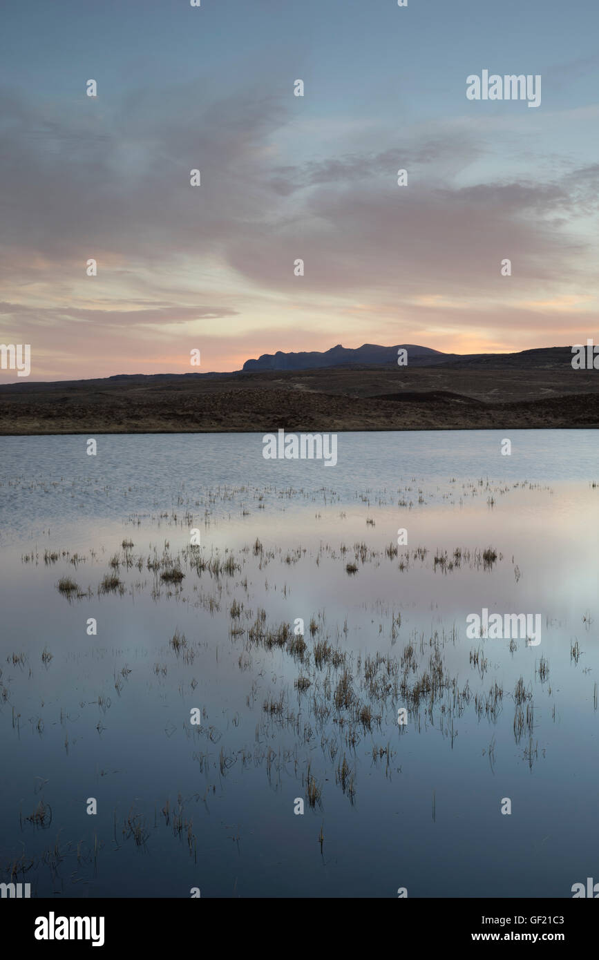 Looking across Loch Meadie in Sutherland to the mountain Ben Loyal, Scottish Highlands, Scotland, UK Stock Photo