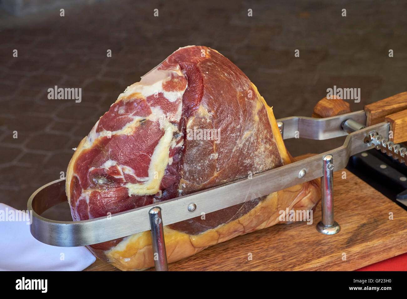 Jambon de Savoie clamped in a vice for carving.  Savoie, France. Stock Photo