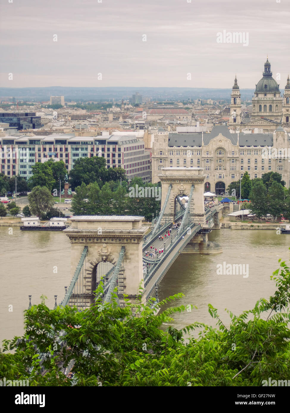 Traffic On Szechenyi Chain Bridge In Budapest, Hungary, Summer Cloudy Day Stock Photo