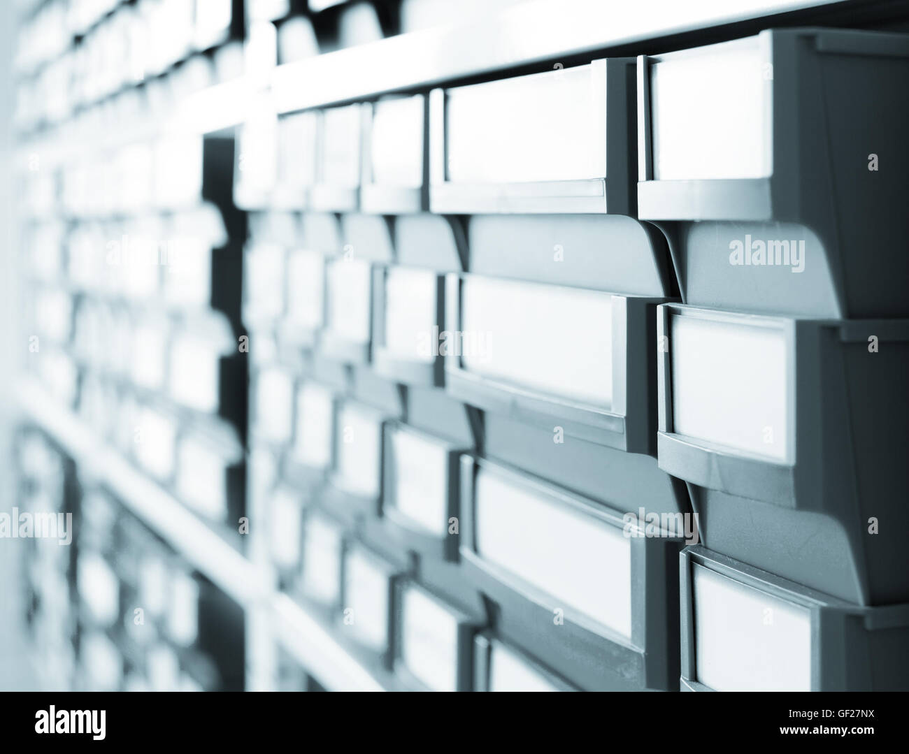 Shelving with plastic boxes Stock Photo Alamy