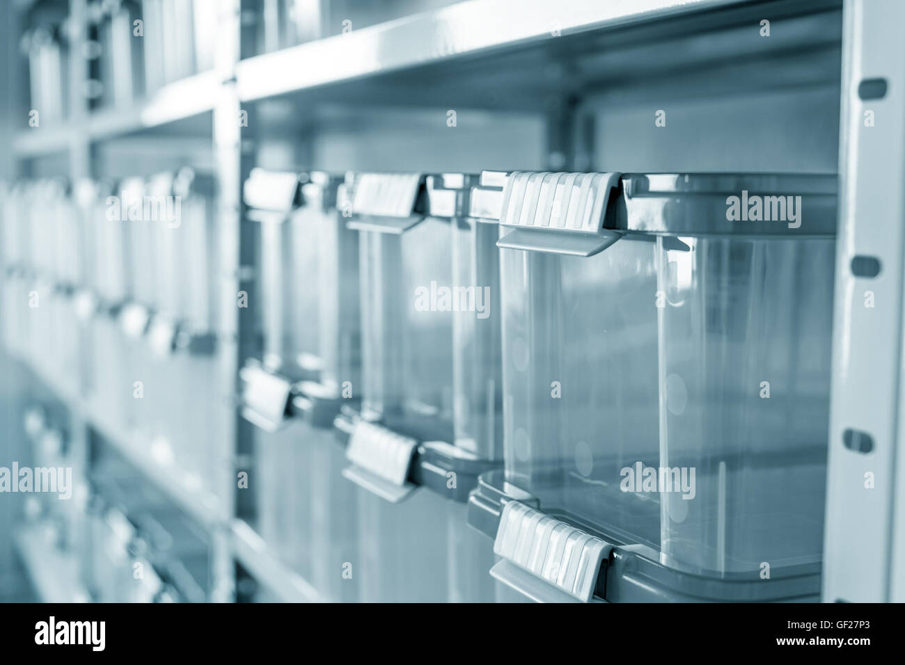 Shelving with plastic boxes Stock Photo Alamy