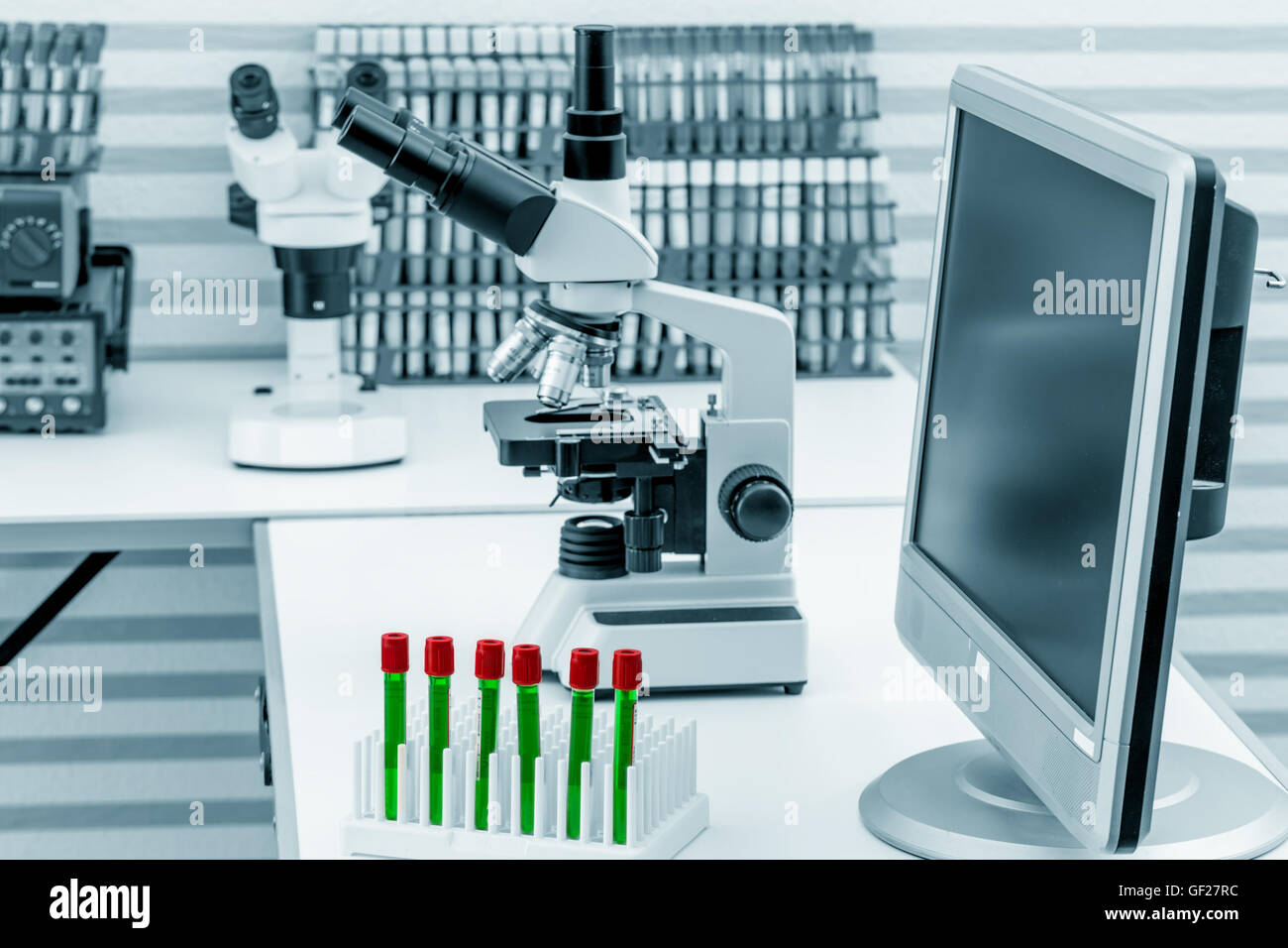 Modern microscope station with tissue section on the screen Stock Photo