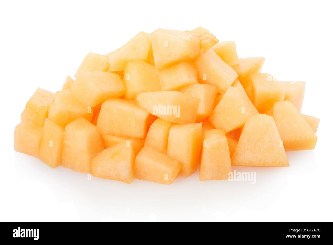 Cantaloupe melon chunks heap on white, clipping path Stock Photo