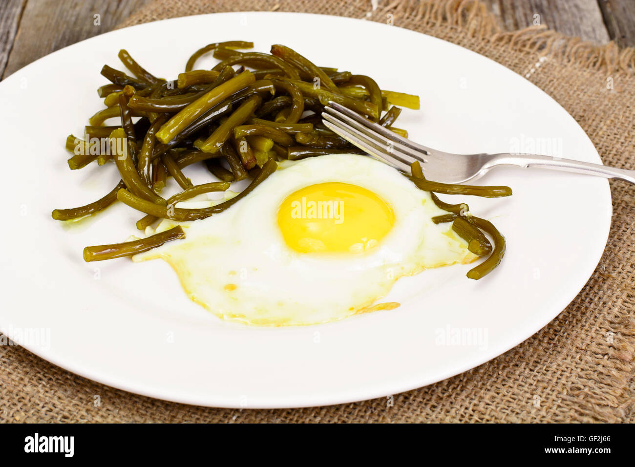 Scrambled Eggs with Fried Green Beans Stock Photo Alamy