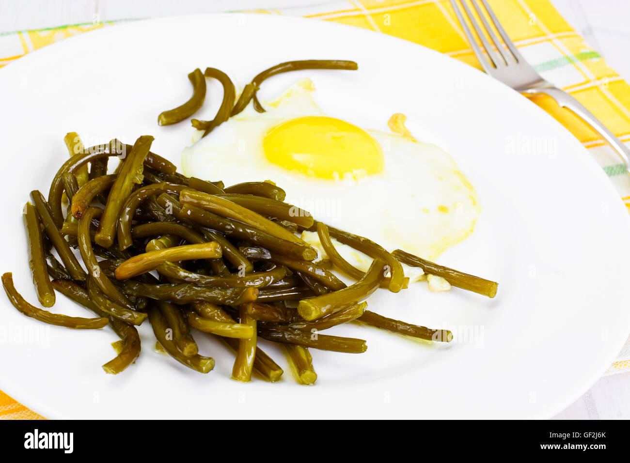 Scrambled Eggs with Fried Green Beans Stock Photo Alamy