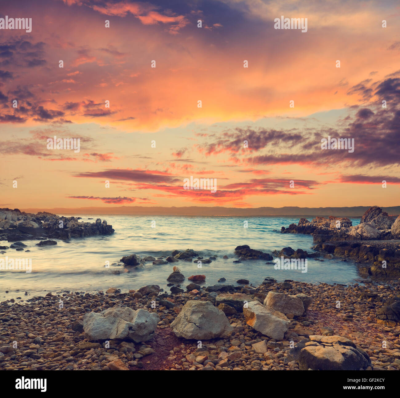 beautiful tropical sunset sky and sea, vintage look Stock Photo - Alamy