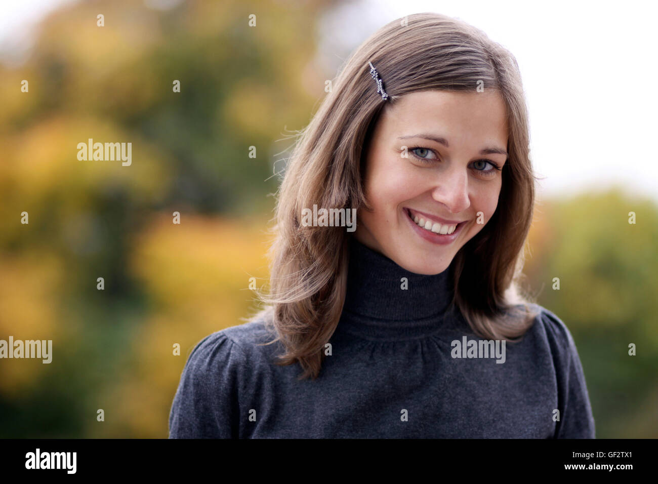 Closeup portrait of a happy young woman smiling Stock Photo - Alamy