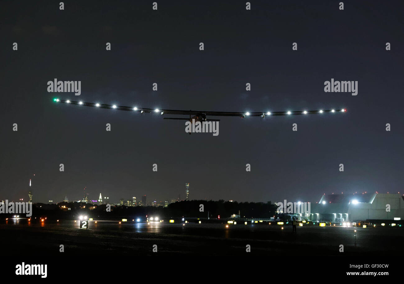 Bertrand Piccard of Switzerland pilots his solar powered aircraft Solar Impulse 2 as it takes off from New York. Stock Photo