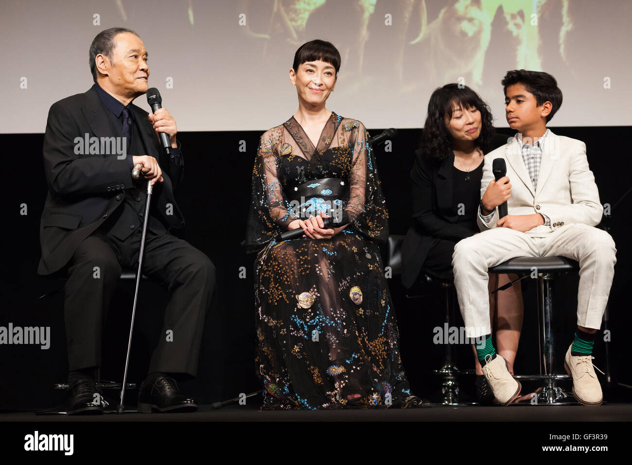 Tokyo, Japan. 27th July, 2016.(L to R) Actor Toshiyuki Nishida, actress Rie Miyazawa and child actor Neel Sethi speak during the Japanese premiere for the film The Jungle Book at Kabuki-za theater in Ginza on July 27, 2016, Tokyo, Japan. Actor Neel Sethi, director Jon Favreau, producer Brigham Taylor and Japanese voice cast appeared on the stage to greet the fans. The movie will be released in Japan on August 11. Credit:  Rodrigo Reyes Marin/AFLO/Alamy Live News Stock Photo