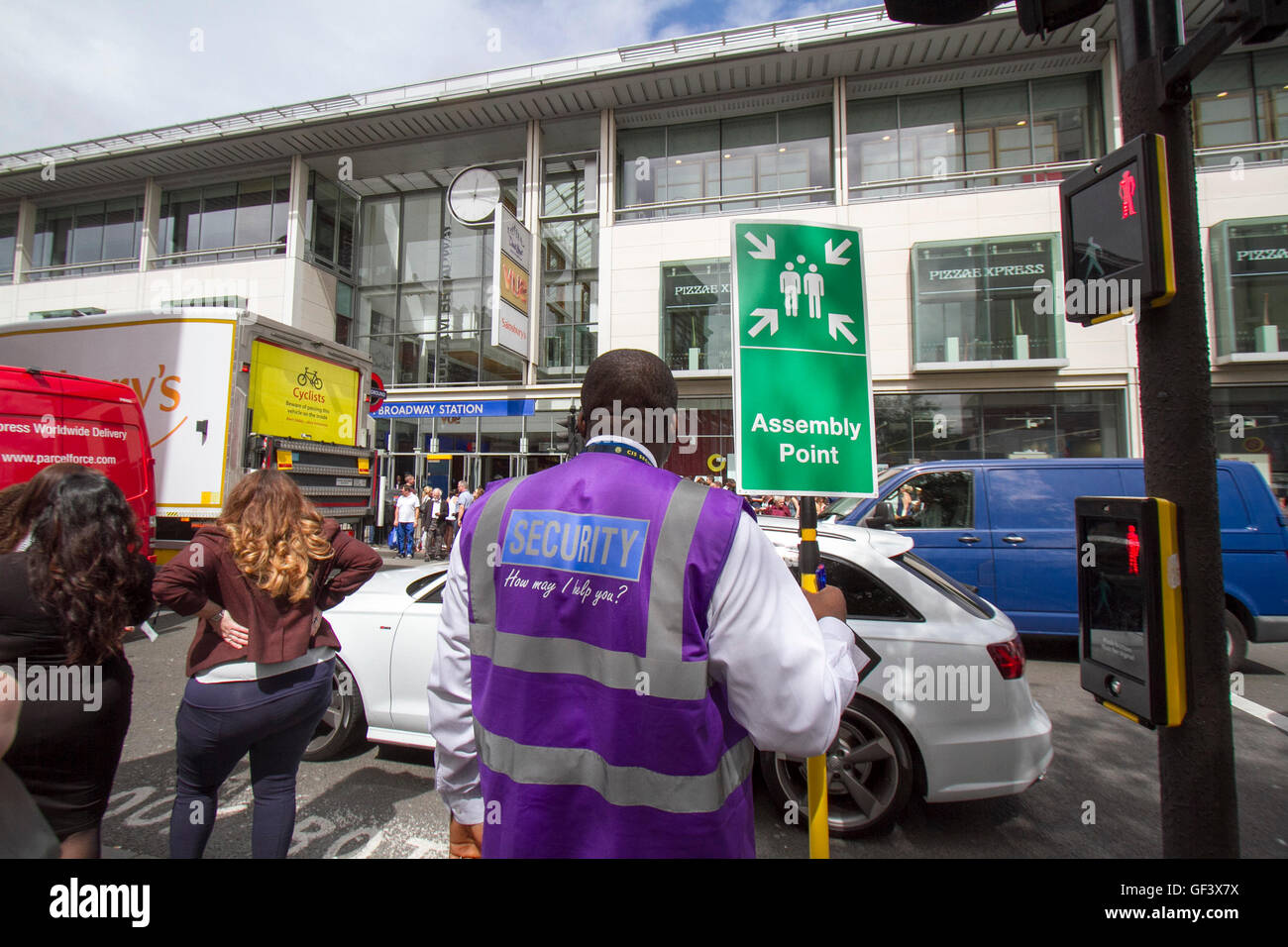 Wimbledon London, UK 28th July 2016. Members of the public and staff were evacuated at Fulham Broadway station and shopping mall  by security staff as security checks were carried out Credit:  amer ghazzal/Alamy Live News Stock Photo