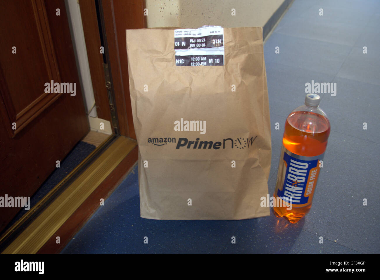 Glasgow, Scotland, UK 28th July 2016. Amazon‘s one hour delivery service expands to Scotland in selected postcodes in Glasgow and the town of Paisley. Glasgow becomes the first Scottish city for it’s one hour “Prime Now” service for its Prime customers. Selected other adjoining areas can access a two hour service To celebrate its Scottish service it gave away free Irn-Bru the local iconic soft drink and a Five pounds discount code. Credit: Gerard Ferry/Alamy Live News Stock Photo