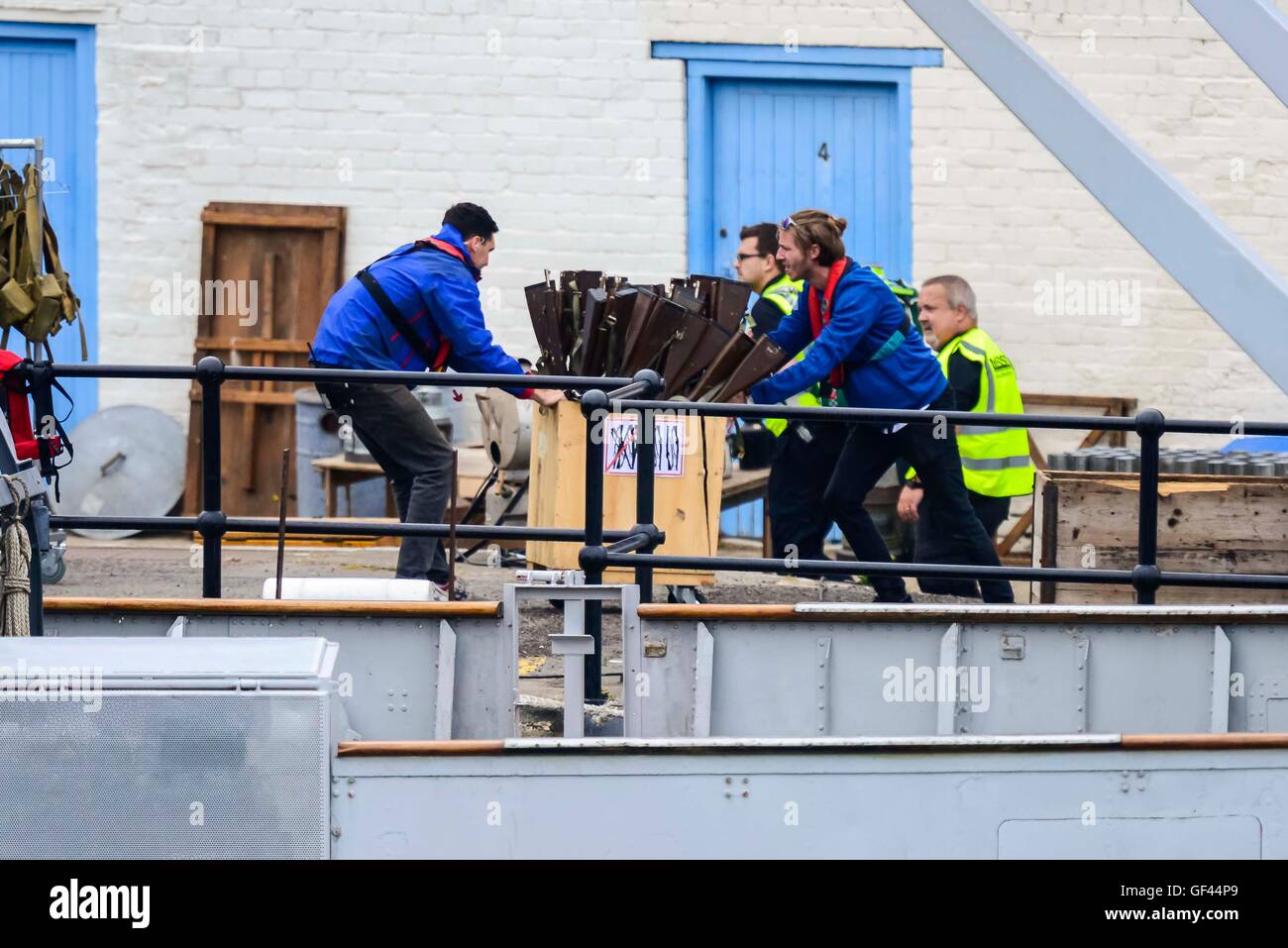 Weymouth Harbour, Dorset, UK. 28th July, 2016. Props being moved into position during the filming of Dunkirk at Weymouth Harbour in Dorset. Picture Credit:  Graham Hunt/Alamy Live News Stock Photo